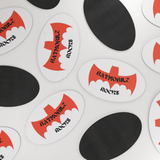 BATMOBILE_ROCKS_Oval_Maginet_OvalCarMagnet_Scattered_H_Mockup.png
