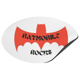 BATMOBILE_ROCKS_Oval_Maginet_OvalCarMagnet_folded_H_Mockup.png